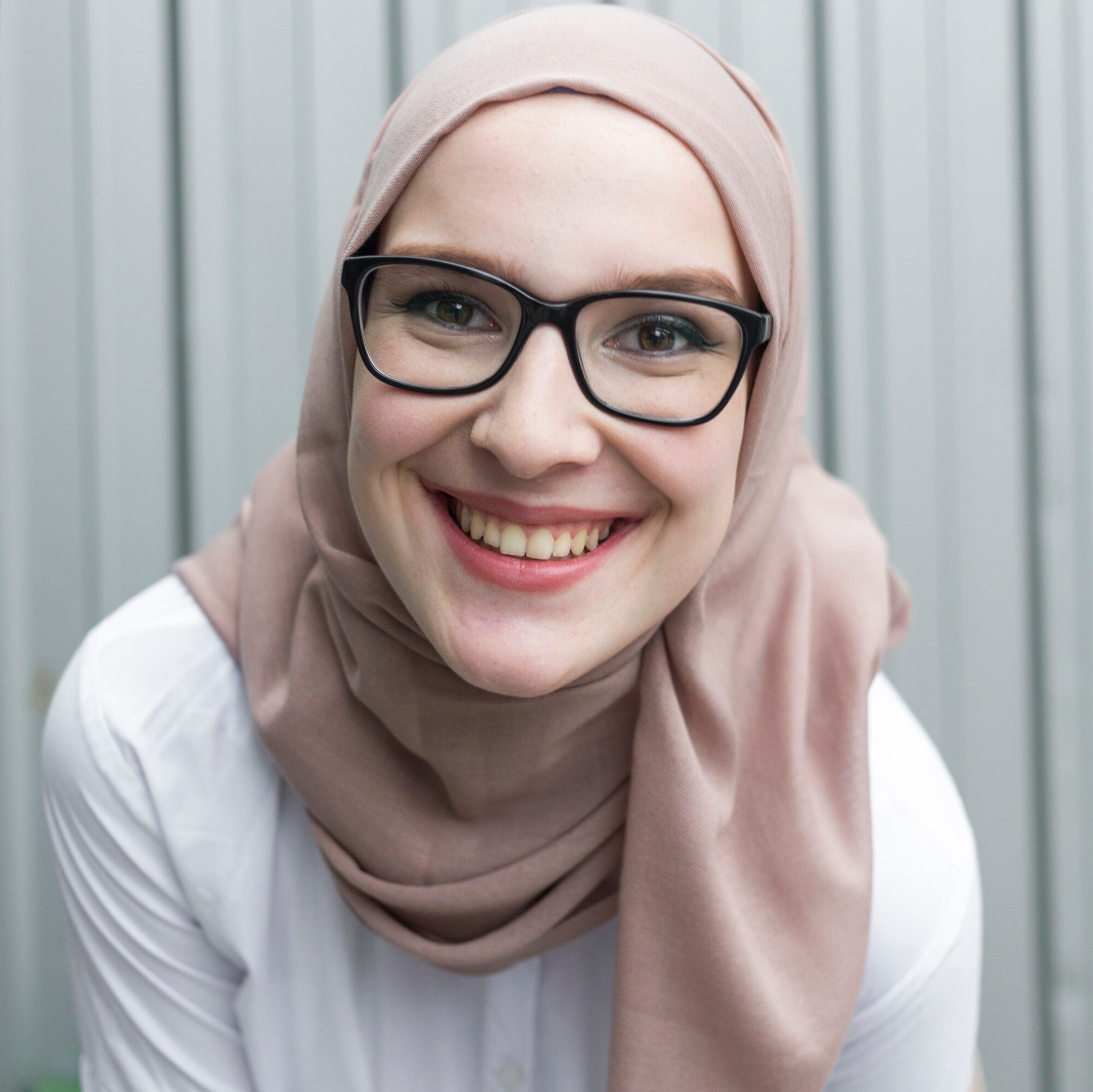Muslim woman entrepreneur smiling