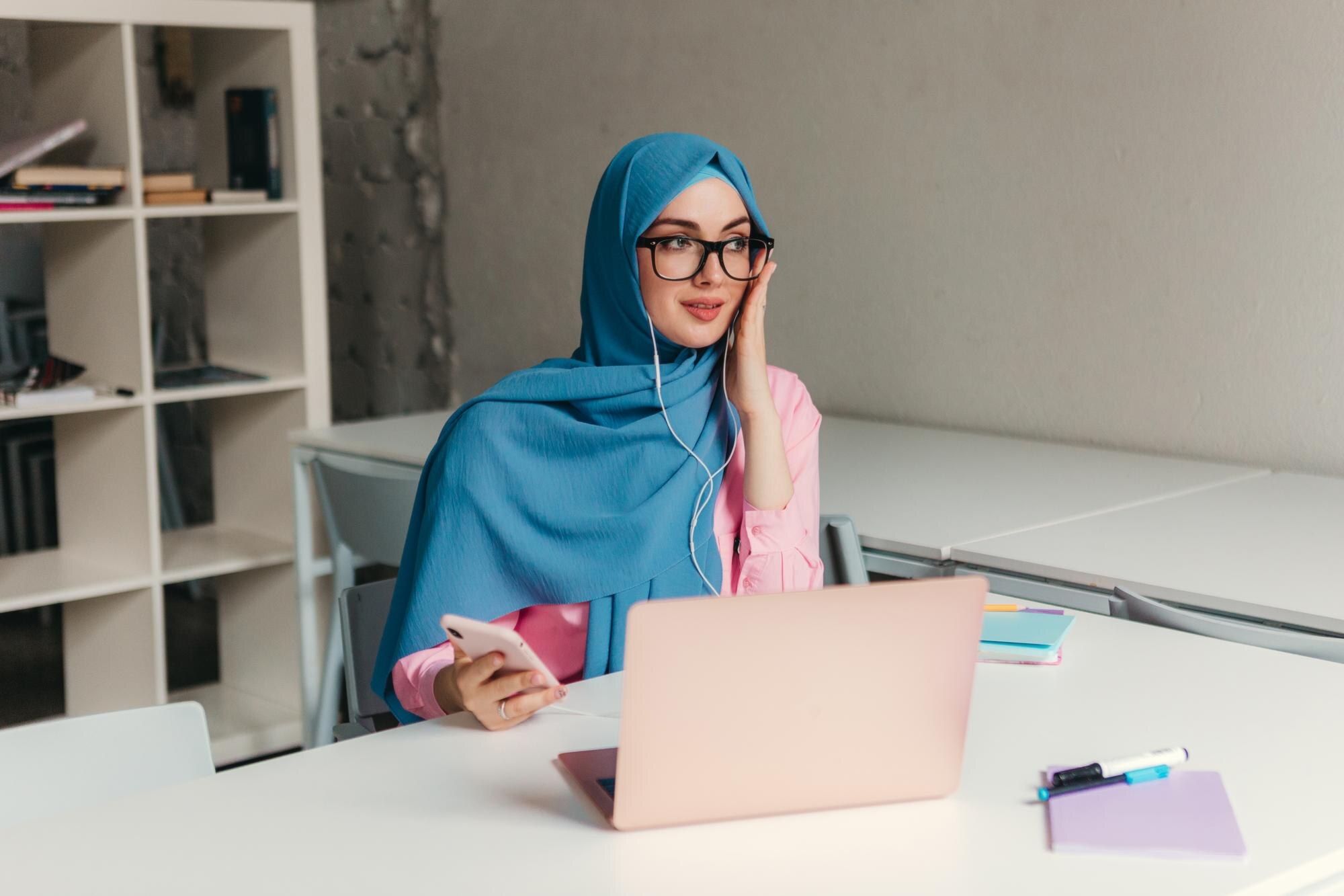 Muslim woman entrepreneur in modern workspace